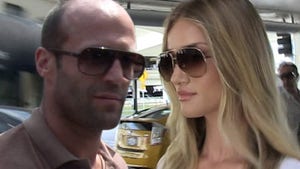 0325_jason_statham_Rosie-Huntington-Whiteley_TMZ