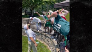 Jason Kelce Shotguns Beers With Fans At Charity Golf Tournament