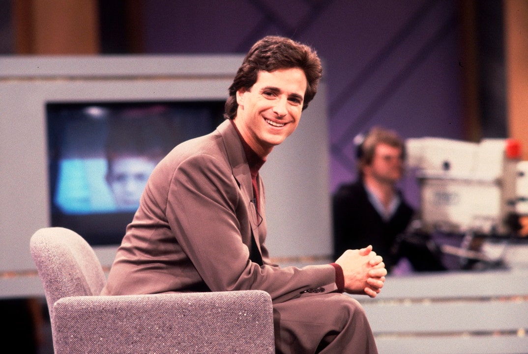 1990: Bob Saget's success continues with appearances on television talk shows including 'Oprah.'