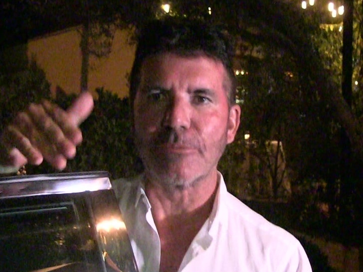 0809 simon cowell tmz 01