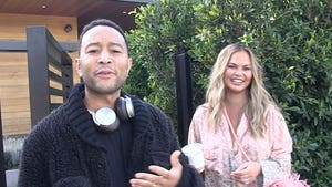 110321-john-legend-chrissy-teigen-primary