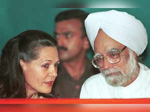 LEADER OF THE CONGRESS PARTY SONIA GANDHI DISPLAYS HER PARTY'S ELECTION MANIFESTO IN NEW DELHI.