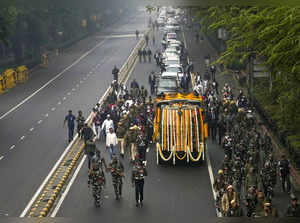 New Delhi: The mortal remains of former prime minister Manmohan Singh being take...