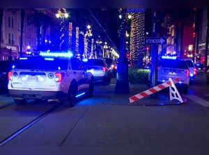 Police attend the scene where a pickup truck drove into a large crowd on Bourbon Street in New Orleans