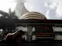 A man walks past the Bombay Stock Exchange (BSE) building in Mumbai