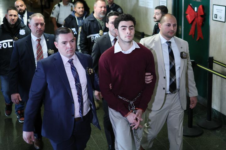 Luigi Mangione was flanked by law enforcement when he arrived at Manhattan Criminal Court in New York on Dec. 23.