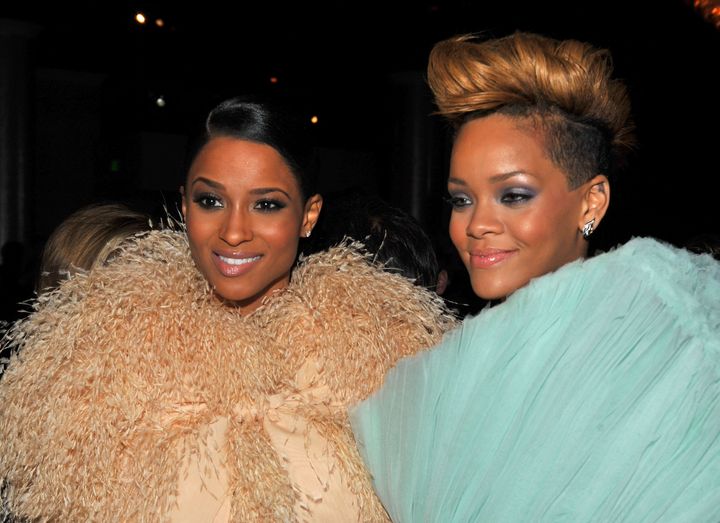 Rihanna is seen to the right of fellow singer Ciara at the Grammy Awards in 2010.