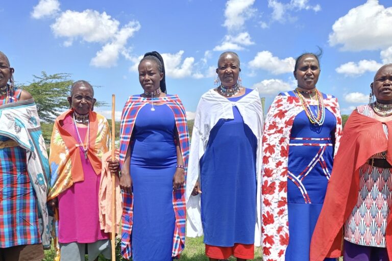 Members of the Nadupoi Women Group gather for a group photo in Olooloitikosh village, Kajiado, Kenya. Image by Juliet Ojwang for Mongabay.