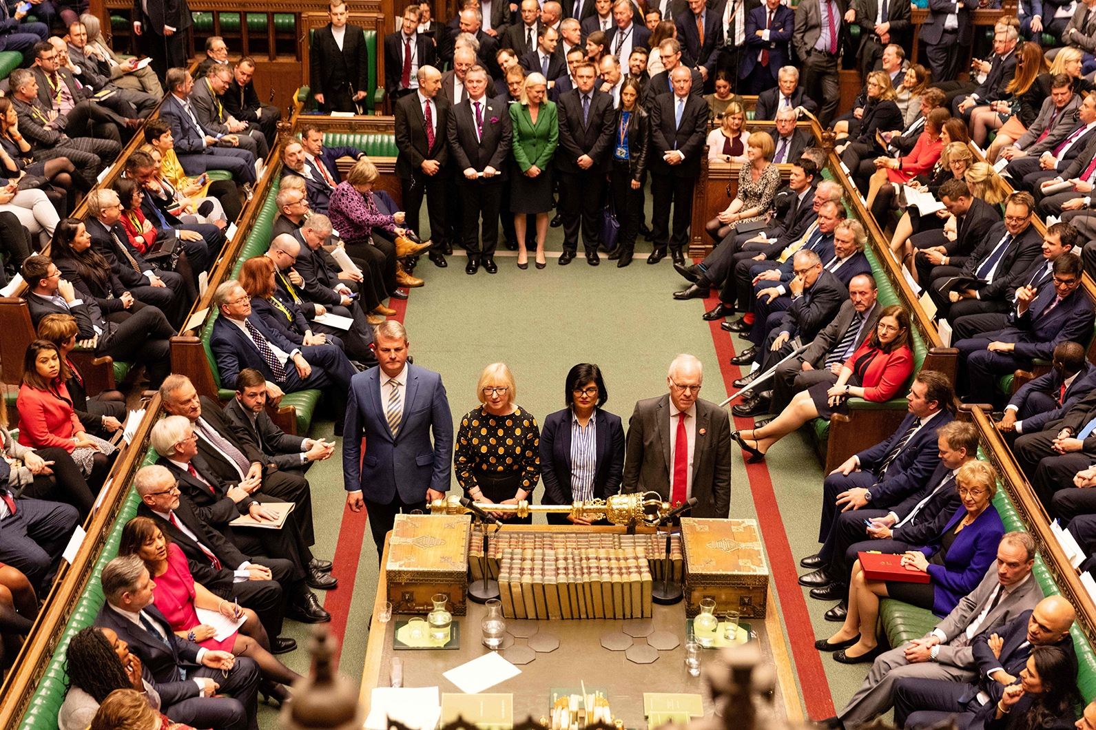 MPs prepare to deliver the result of the vote on the Queen's Speech