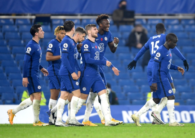 Chelsea's Timo Werner (centre) celebrates with his teammates after scoring his side's fourth goal of the game during the Premier League match at Stamford Bridge, London. PA Photo. Picture date: Saturday November 7, 2020. See PA story SOCCER Chelsea. Photo credit should read: Mike Hewitt/PA Wire. RESTRICTIONS: EDITORIAL USE ONLY No use with unauthorised audio, video, data, fixture lists, club/league logos or "live" services. Online in-match use limited to 120 images, no video emulation. No use in betting, games or single club/league/player publications.