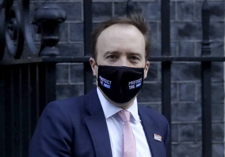 Britain's Secretary of State for Health Matt Hancock leaves 10 Downing Street in London, Wednesday, Feb. 10, 2021. (AP Photo/Kirsty Wigglesworth)