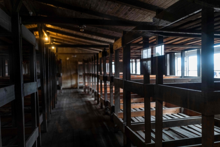 (FILES) This file photo taken on February 7, 2020 shows a view of the sleeping quarters in barrack 38, in the former Sachsenhausen concentration camp, now a memorial, in Oranienburg near Berlin, northeastern Germany. - A 100-year-old former concentration camp guard will on October 7, 2021 become the oldest person yet to be tried for Nazi-era crimes in Germany when he goes before court charged with complicity in mass murder. The suspect, identified only as Josef S., stands accused of "knowingly and willingly" assisting in the murder of 3,518 prisoners at the Sachsenhausen camp in Oranienburg, between 1942 and 1945. (Photo by John MACDOUGALL / AFP) (Photo by JOHN MACDOUGALL/AFP via Getty Images)