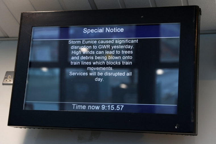 A noticeboard warns of disruption to the train network after Storm Eunice, in St Austell, Cornwall, Britain, February 19, 2022. REUTERS/Tom Nicholson