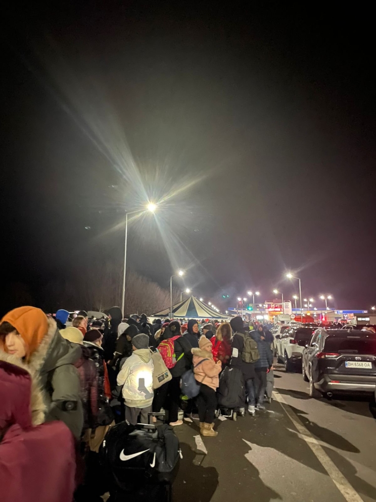 This shows the queue at the border when Julia Osiyevska travelled on a bus for 19 hours with pregnant surrogates and their children to transport them to safety in Moldova (Photo: Julia Osiyevska)