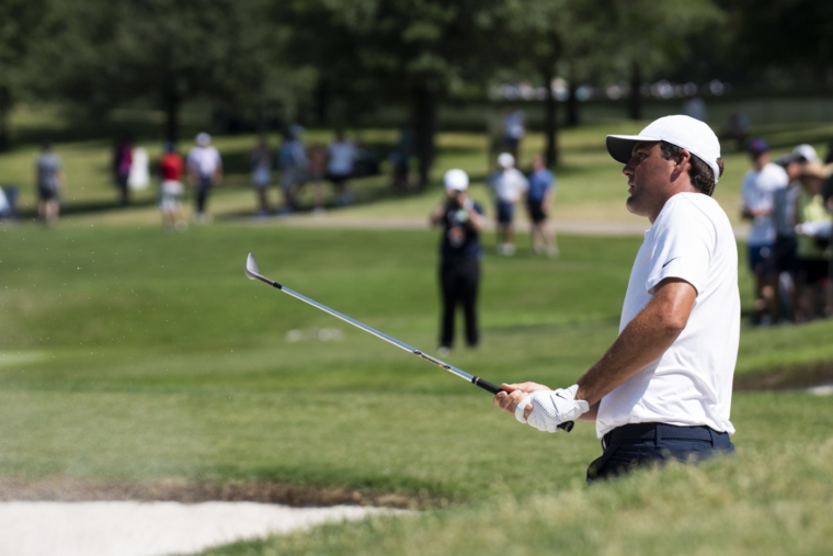 Scottie Scheffler watches his shot land on the green of the first hole during the fourth round of the AT&T Byron Nelson golf tournament in McKinney, Texas, on Sunday, May 15, 2022. (AP Photo/Emil Lippe)