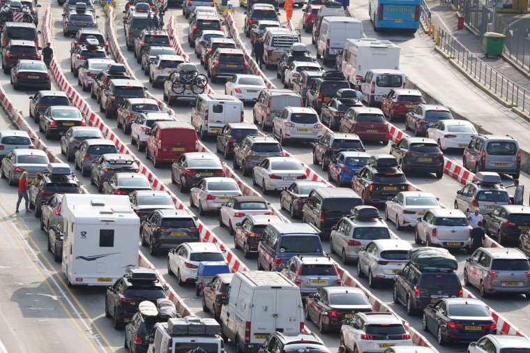 Cars queue at the check-in at the Port of Dover in Kent as many families embark on getaways following the start of summer holidays for many schools in England and Wales. Picture date: Saturday July 23, 2022. PA Photo. The RAC said an estimated 18.8 million leisure trips are planned in the UK between Friday and Monday. See PA story TRANSPORT Getaway. Photo credit should read: Gareth Fuller/PA Wire