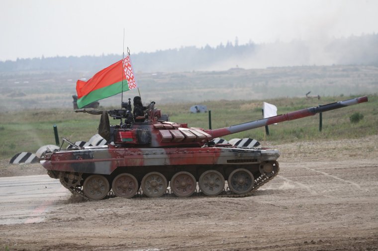 MOSCOW, RUSSIA - AUGUST 27: (RUSSIA OUT) Team of Belarus on a T-72 B3 battle tank with Belarussian flag attend the finals of the tank biathlon at a military polygon, on August 27, 2022, in Alabino, outside of Moscow, Russia. The International Army Games ARMi-2022, organized by Russian Ministry of Defense are running August 13-27 and taking place this year against the tense backdrop of war in Ukraine. (Photo by Contributor/Getty Images)