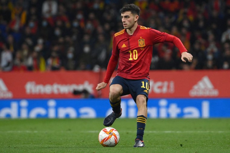 (FILES) In this file photo taken on March 26, 2022 Spain's midfielder Pedri controls the ball during the friendly football match between Spain and Albania at??the RCDE Stadium in Cornella de Llobregat near Barcelona. (Photo by LLUIS GENE / AFP) (Photo by LLUIS GENE/AFP via Getty Images)