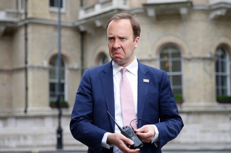 LONDON, ENGLAND - MAY 16: Secretary of State for Health and Social Care, Matt Hancock holds a microphone during a Sky interview outside the BBC before appearing on the Andrew Marr show on May 16, 2021 in London, England. Today's show takes place a day before the UK further eases its Covid-19 lockdown measures, permitting more indoor activities and mixing of different households. (Photo by Hollie Adams/Getty Images)