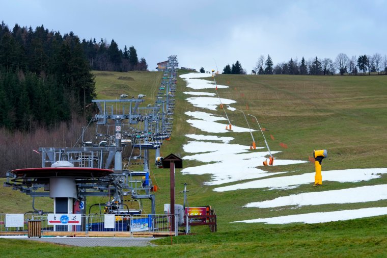 View of a closed ski slope at a ski resort near Liberec, Czech Republic, Thursday, Jan. 5, 2023. Due to the recent warm weather mountains across Europe suffer from unusual lack of snow. (AP Photo/Petr David Josek)