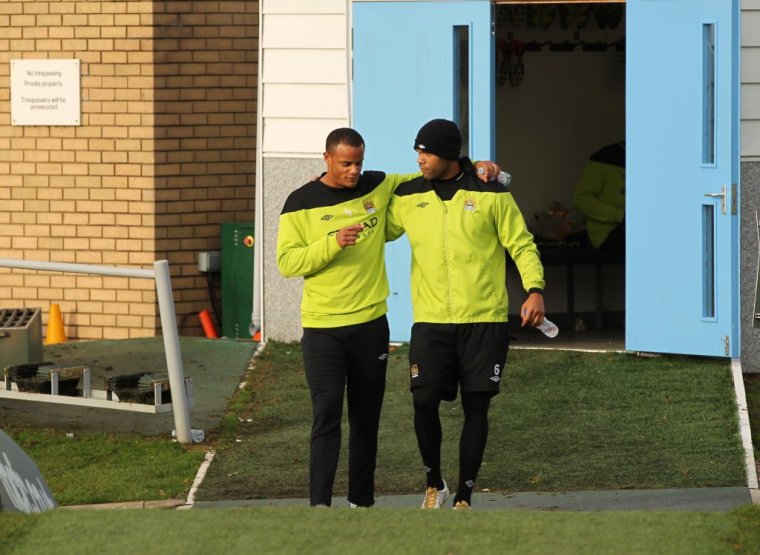 Manchester City Training Session, Carrington Training Ground, Manchester City's Vincent kompany (L) and Joleon Lescott (Photo by Sharon Latham/Manchester City FC via Getty Images)