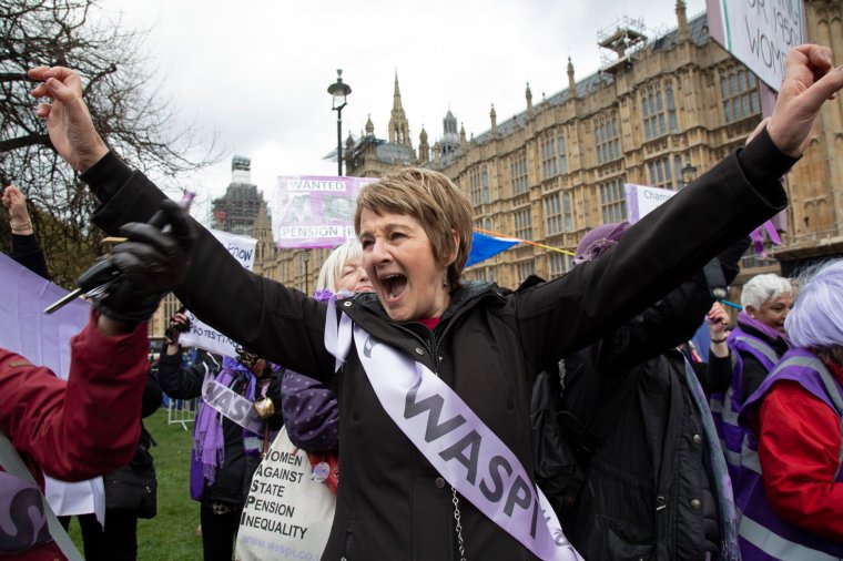 WASPI women protest joins in the Anti Brexit demonstration after breaking through the barriers onto College Green in Westminster on the day after the meaningful vote when MPs again rejected the Prime Ministers Brexit Withdrawal Agreement and before a vote on removing the possibility of a No Deal Brexit on 13th March 2019 in London, England, United Kingdom. Women Against State Pension Inequality is a voluntary UK-based organisation founded in 2015 that campaigns against the way in which the state pension age for men and women was equalised. They call for the millions of women affected by the change to receive compensation. (photo by Mike Kemp/In Pictures via Getty Images Images)