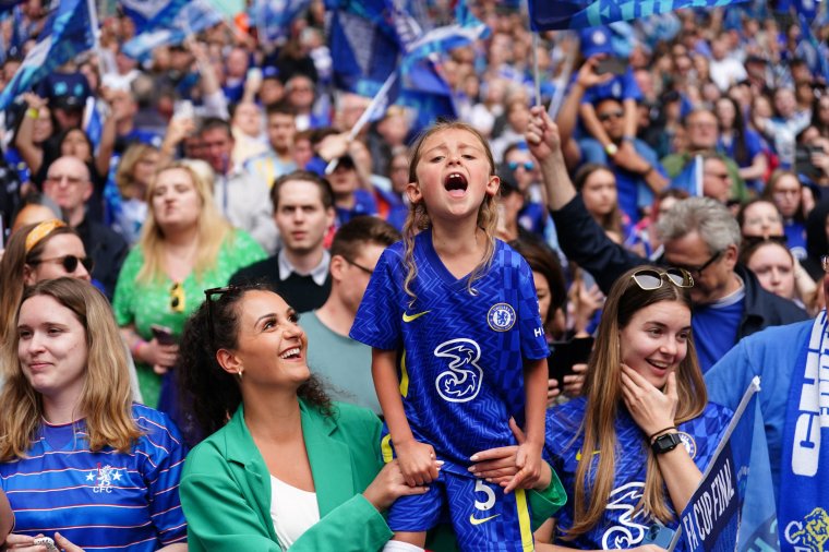 Chelsea fans in the stands celebrate following the Vitality Women's FA Cup final at Wembley Stadium, London. Picture date: Sunday May 14, 2023. PA Photo. See PA story SOCCER Women Final. Photo credit should read: Mike Egerton/PA Wire. RESTRICTIONS: Use subject to restrictions. Editorial use only, no commercial use without prior consent from rights holder.