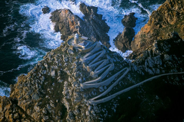 Galicia from the air. As Cies Lighthouse. The central island is known as O Faro (Lighthouse) due to the tower that rises up at the summit of bold headland which opens onto the open sea. In these islands it is necessary to point out the rare guillemots and petrels along with the abundant shags, one of the most numerous colonies in southwest European. (Photo by Xurxo Lobato/Cover/Getty Images)