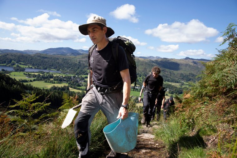 16/08/23 Grasmere , Cumbria - National Trust staff repair the footpath tothe fell Stone Arthur in The Lake District