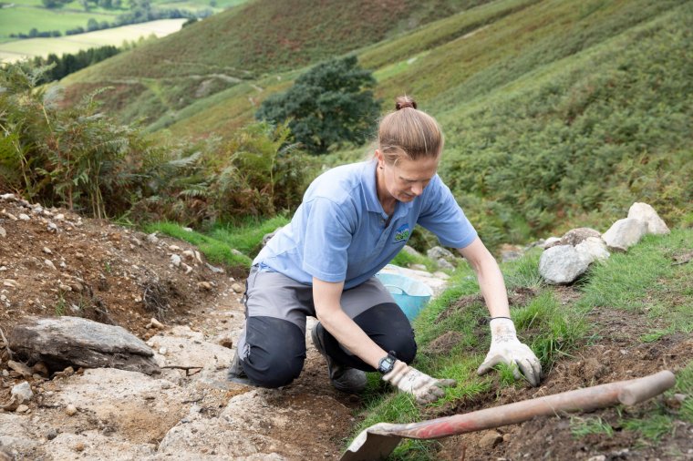 16/08/23 Grasmere , Cumbria - National Trust staff repair the footpath tothe fell Stone Arthur in The Lake District