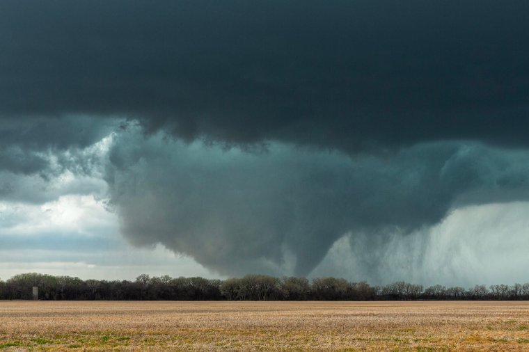 Tornado Alley is a colloquial term for the area of the United States (or by some definitions extending into Canada) where tornadoes are most frequent.[1] The term was first used in 1952 as the title of a research project to study severe weather in parts of Texas, Oklahoma, Kansas, South Dakota, Iowa, Illinois, Missouri, New Mexico, Colorado, North Dakota, and Minnesota only.[citation needed] It is largely a media-driven term although tornado climatologists distinguish peaks in activity in various areas[2] and storm chasers have long recognized the Great Plains tornado belt.[3] Although the boundaries of Tornado Alley are not clearly defined, its core extends from northern Texas, Oklahoma, Kansas, into Nebraska.[4] Some research suggests that tornadoes are becoming more frequent in the northern parts of Tornado Alley where it reaches the Canadian prairies.[5] Storm Chaser Photographer Sarah Hasan Image supplied via Sarah H. AlSayegh