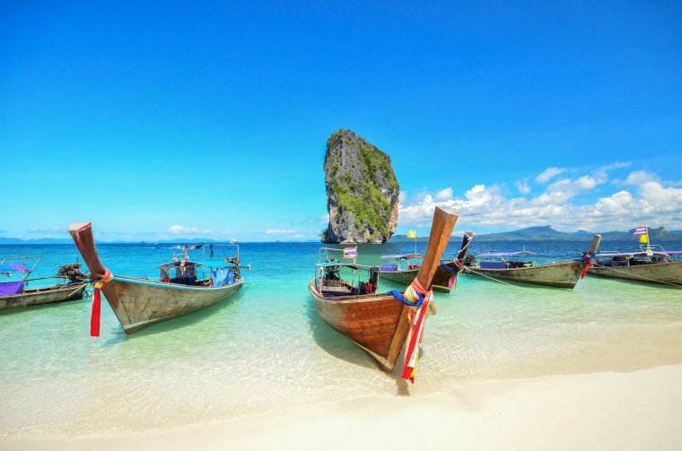 Long tailed boat Ruea Hang Yao park at sea in Phuket Thailand