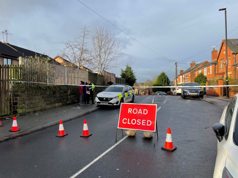 A police cordon on Scott Road, Burngreave, after a 46-year-old man died and several others were injured after a car hit a crowd of people during violence in Sheffield. A 23-year-old man has been arrested on suspicion of murder and a 55-year-old man on suspicion of attempted murder, South Yorkshire Police said. Picture date: Thursday December 28, 2023. See PA story POLICE Burngreave. Photo credit should read: Dave Higgens/PA Wire