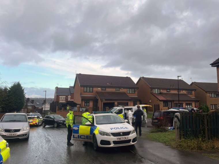 Police officers at the scene at College Court, Burngreave, after a 46-year-old man died and several others were injured after a car hit a crowd of people during violence in Sheffield. A 23-year-old man has been arrested on suspicion of murder and a 55-year-old man on suspicion of attempted murder, South Yorkshire Police said. Picture date: Thursday December 28, 2023. See PA story POLICE Burngreave. Photo credit should read: Dave Higgens/PA Wire