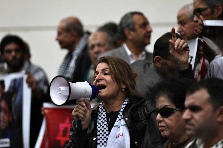 Journalists are protesting in support of Palestinians amid the ongoing conflict between Israel and the Palestinian Islamist group Hamas in front of the Egypt Journalists Syndicate in Cairo, Egypt, on December 13, 2023. The Journalists Syndicate is expressing solidarity with Gaza, rejecting the displacement of Palestinians, and demanding a ceasefire and the opening of the Rafah crossing to allow aid to enter Gaza. (Photo by Mahmoud Elkhwas/NurPhoto via Getty Images)