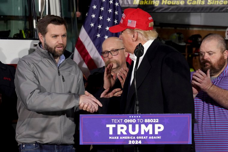 FILE - Former President Donald Trump greets Sen. JD Vance, R-Ohio, at the East Palestine Fire Department as he visits the area in the aftermath of the Feb. 3, 2023, Norfolk Southern train derailment in East Palestine, Ohio, Feb. 22. While vice presidential candidates typically aren't tapped until after a candidate has locked down the nomination, Trump's decisive win in the Iowa caucuses and the departure of Florida Gov. Ron DeSantis from the race has only heightened what had already been a widespread sense of inevitability. Vance is considered a close ally of the former president who is among those being considered for the job. (AP Photo/Matt Freed, File)