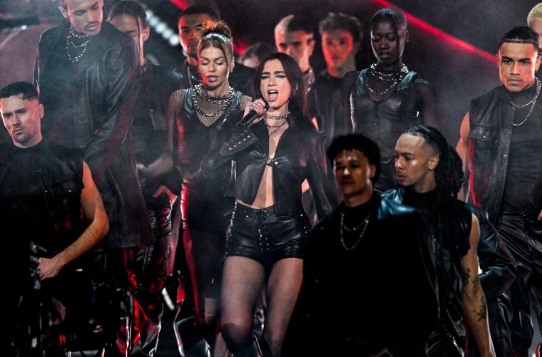 LONDON, ENGLAND - MARCH 02: (EDITORIAL USE ONLY. NO PUBLICATIONS DEVOTED EXCLUSIVELY TO THE ARTIST) Dua Lipa performs on stage during the BRIT Awards 2024 at The O2 Arena on March 02, 2024 in London, England. (Photo by Gareth Cattermole/Getty Images)