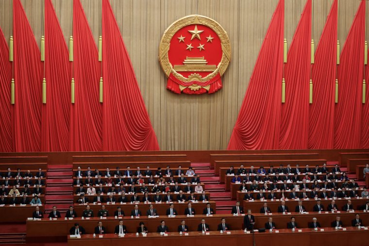 Chinese President Xi Jinping and other leaders attend the closing session of the National People's Congress (NPC) at the Great Hall of the People in Beijing, China March 11, 2024. REUTERS/Tingshu Wang