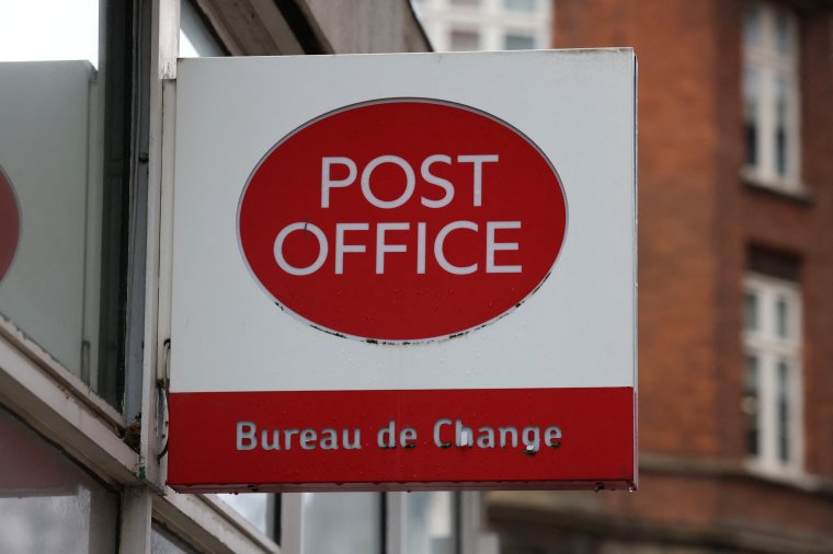 Signage at a Post Office branch in Westminster, London, Britain, March 12, 2024. REUTERS/Hollie Adams