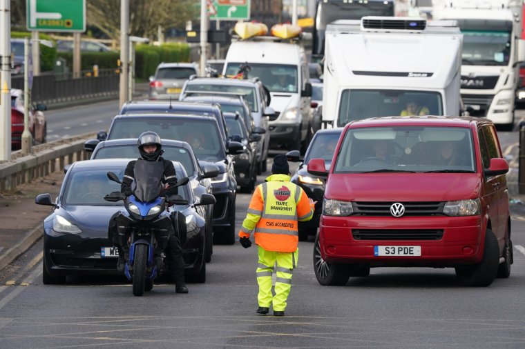 Traffic management in Dover for cars, coaches and lorries as they queue to enter the Port of Dover in Kent to board ferries as the getaway continues for the Easter weekend. Picture date: Friday March 29, 2024. PA Photo. Photo credit should read: Gareth Fuller/PA Wire