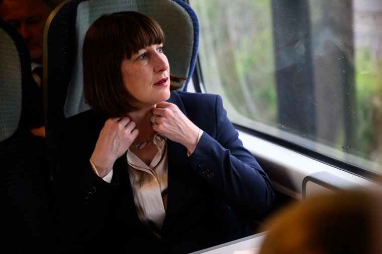 THE MIDLANDS, UNITED KINGDOM - APRIL 22: Shadow Chancellor Rachel Reeves travels by train for a Shadow Cabinet meeting on April 22, 2024 in the Midlands, United Kingdom. Labour Party leader Keir Starmer has called for people to "fly the flag" on St George's Day, after writing to all of Labour's general election candidates in a bid to promote the party's use of national identity. (Photo by Leon Neal/Getty Images)