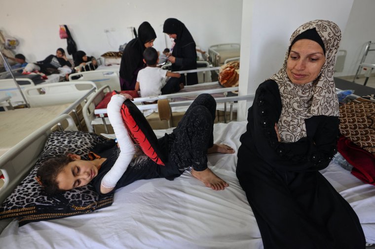 Wounded Palestinians receive treatment at a clinic set up by medical charity Doctors Without Borders (MSF) treating severe injuries and burns sustained in Israeli bombardment, at the Rafah Indonesian Field Hospital in Rafah in the southern Gaza Strip on April 24, 2024, amid ongoing battles between Israel and the Palestinian Hamas movement. (Photo by MOHAMMED ABED / AFP) (Photo by MOHAMMED ABED/AFP via Getty Images)