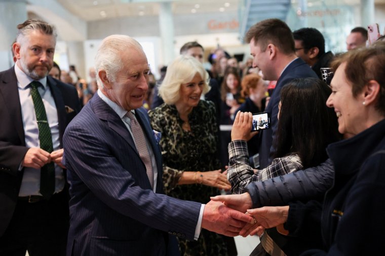 King Charles III, patron of Cancer Research UK and Macmillan Cancer Support, and Queen Camilla meet staff members as they arrive for a visit to University College Hospital Macmillan Cancer Centre, London, to raise awareness of the importance of early diagnosis and highlight some of the innovative research which is taking place at the centre. Picture date: Tuesday April 30, 2024. PA Photo. See PA story ROYAL King. Photo credit should read: Suzanne Plunkett/PA Wire