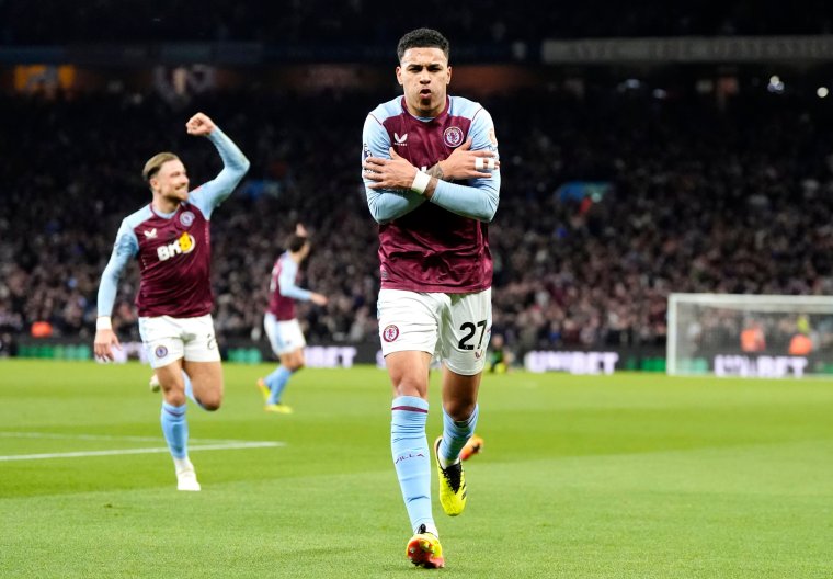 Aston Villa's Morgan Rogers (centre) scores their side's second goal of the game with team-mates during the Premier League match at Villa Park, Birmingham. Picture date: Saturday April 27, 2024. PA Photo. See PA story SOCCER Villa. Photo credit should read: Nick Potts/PA Wire. RESTRICTIONS: EDITORIAL USE ONLY No use with unauthorised audio, video, data, fixture lists, club/league logos or "live" services. Online in-match use limited to 120 images, no video emulation. No use in betting, games or single club/league/player publications.