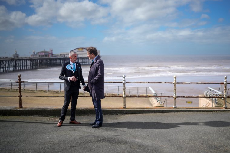 BLACKPOOL, ENGLAND - APRIL 06: Leader of the Reform UK Party Richard Tice and and Mark Butcher, (L) the Reform UK candidate for the Blackpool South by-election walk along the promenade during a visit to seafront businesses on April 06, 2024 in Blackpool, England. Scott Benton MP resigned after being suspended from the Conservative Party for a lobbying scandal and facing the imminent possibility of being ousted by voters. His resignation triggered a by-election set for May 2nd. (Photo by Christopher Furlong/Getty Images)