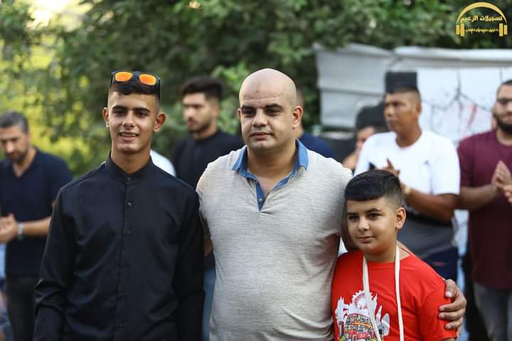 Qais Nasrallah (r) with his father, Fathi, and brother, Leith (Photo: Fathi Nasrallah)