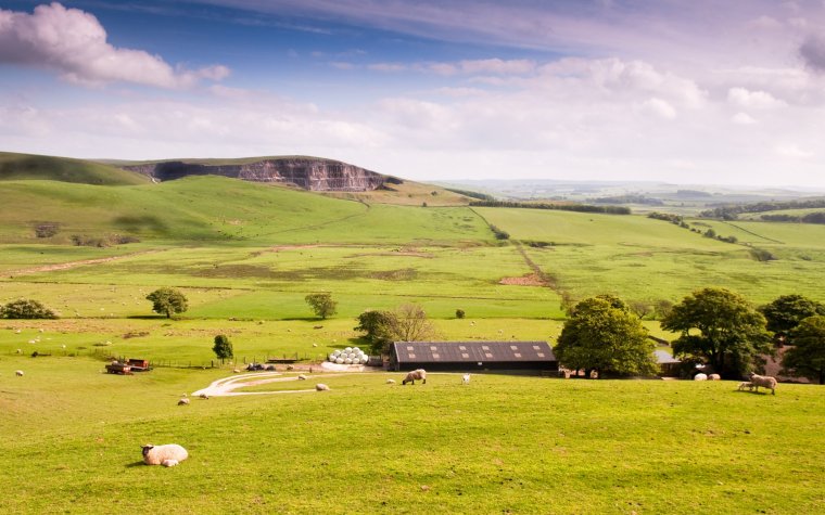 The scar of the disused quarries at Eldon Hill in the White Peak area of England's Peak District National Park, seen from Rushup Edge.