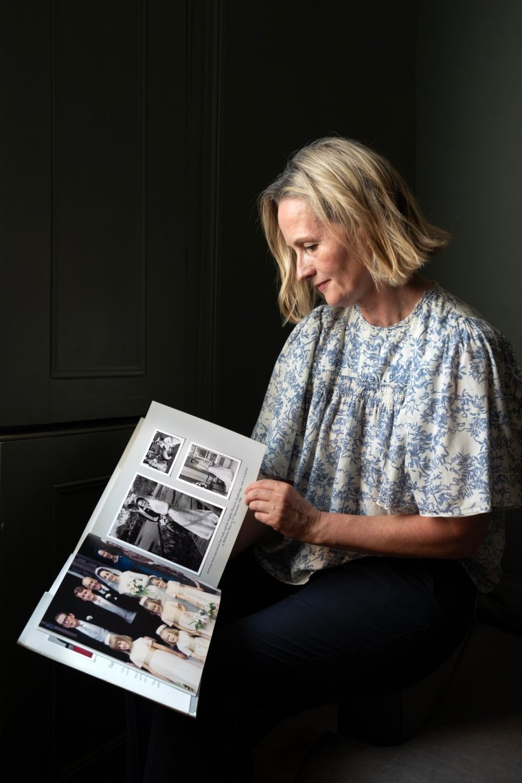 Christina Hopkinson at home in London with a book she made about her Mother. 25/6/24. Photo Tom Pilston