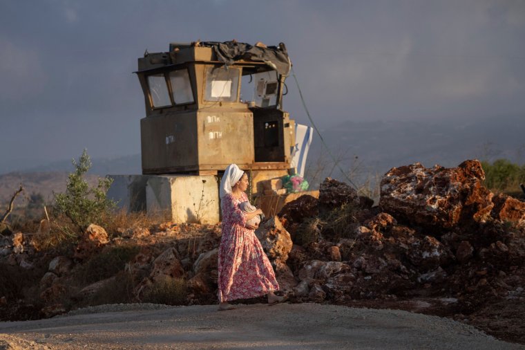 A Jewish settler come to pray in the Eviatar outpost in the Israeli-occupied West Bank during morning prayers calling for the legalization of the outpost and the return of the hostages held in the Gaza Strip by the Hamas militant group, Sunday, July 7, 2024. Far-right ministers in Israel???s government have said they want to legalize unauthorized outposts in the West Bank in a sweeping expansion of settlements. (AP Photo/Ohad Zwigenberg)