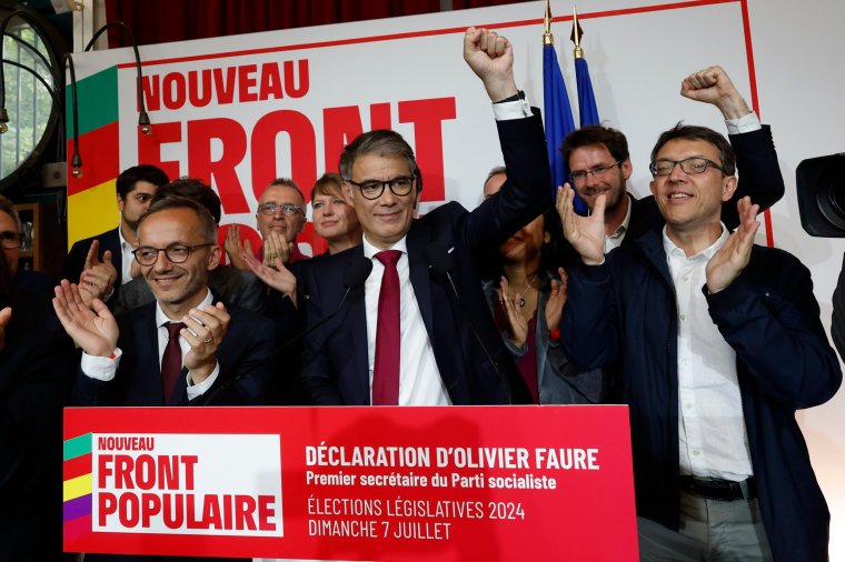 Olivier Faure, First Secretary of the Socialist Party, clenches his fist after the second round of the legislative elections, Sunday, July 7, 2024, at the party election night headquarters in Paris. A coalition on the left that came together unexpectedly ahead of France's snap elections won the most parliamentary seats in the vote, according to polling projections Sunday. The surprise projections put President Emmanuel Macron's centrist alliance in second and the far right in third. (AP Photo/Aurelien Morissard)